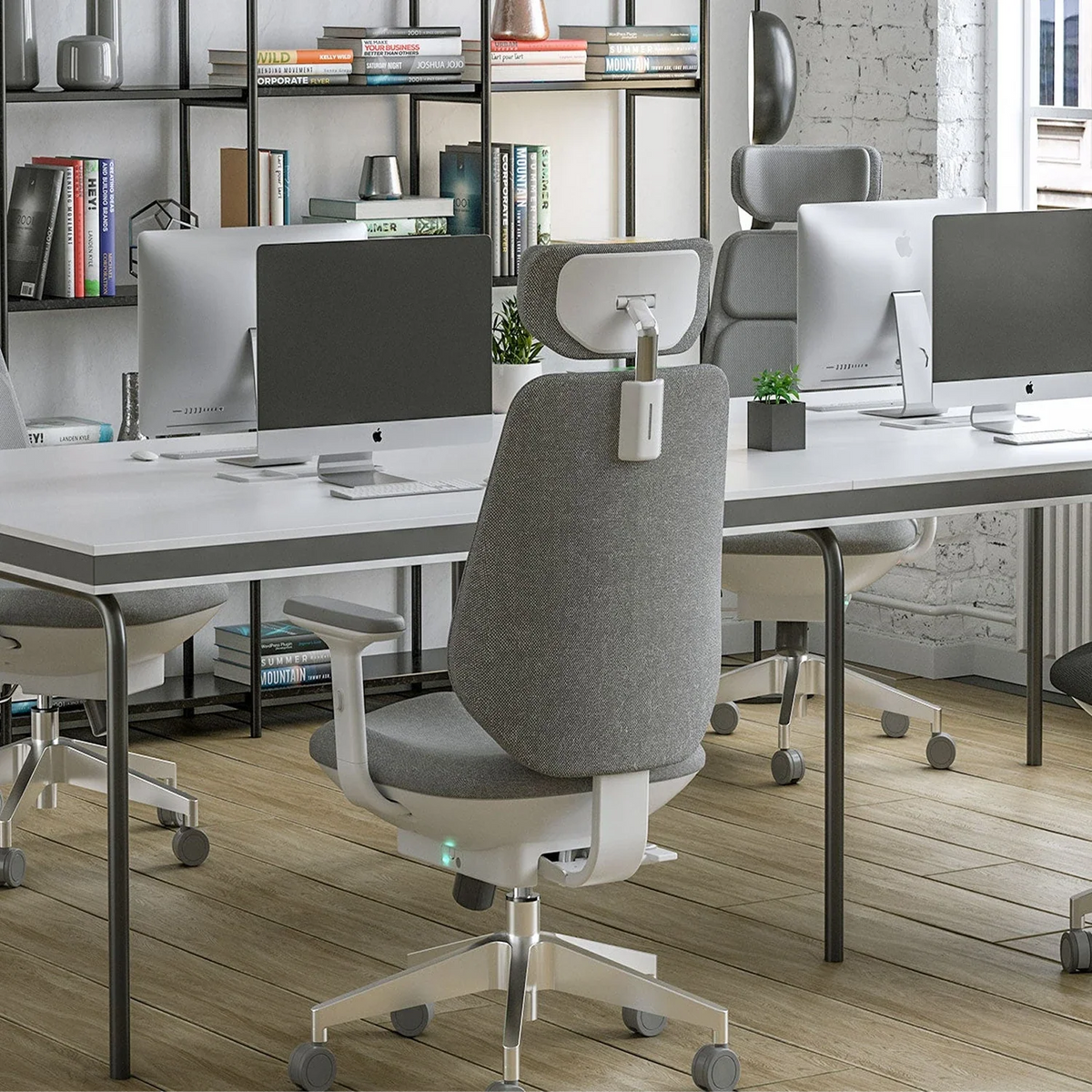 [scene] Air-Smart chair in modern open office workspace with multiple workstations.